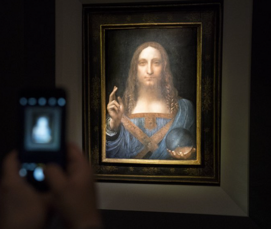 The painting ‘Salvator Mundi’ by Leonardo da Vinci at Christie’s sells for $450 Million